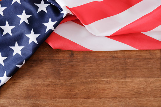United States flag on wooden background
