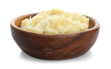 Bowl with mashed potatoes on white background