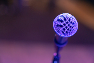 Close up of microphone on a stage