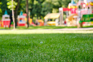 Colorful playground on yard in the park. Fun childhood - obrazy, fototapety, plakaty