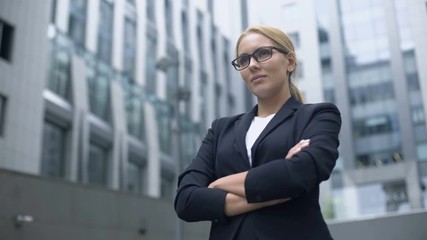 Confident business lady taking challenge, purposeful and smart in achieving goal