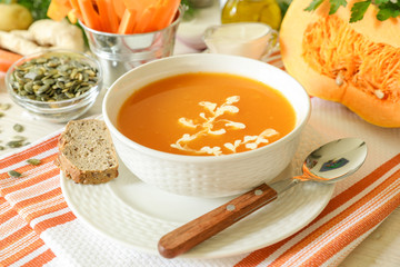 The tasty pumpkin soup puree and ingredients.