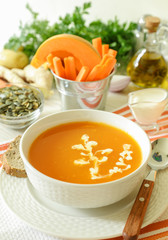 The tasty pumpkin soup puree and ingredients.