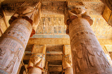 Beautiful interior of the temple of Dendera or the Temple of Hathor. Colorful zodiac on the ceiling of the ancient Egyptian temple. Egypt, Dendera, near the city of Ken - obrazy, fototapety, plakaty