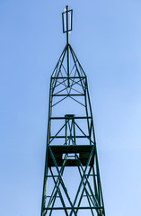 Geodetic point against the blue sky