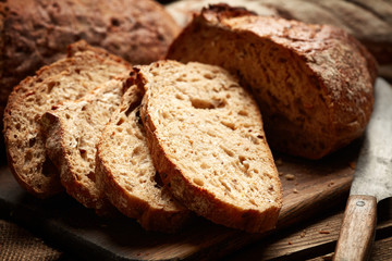 slices of bread on wooden background