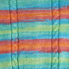 Colorful knitted texture. Handmade Knitwear. Background