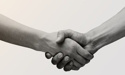 Business agreement handshake on white background. Black and - obrazy, fototapety, plakaty