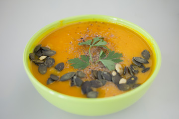 Homemade pumpkin soup and  pumpkin seeds