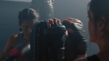 healthy woman athlete training coach teaching self defence in boxing workout tough female punching enjoying intense warm up friends practice together in fitness gym