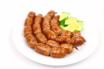 Easten thai sausage (Thai name is Sai Krok Isan) on white background.
ground pork with vermicelli,Rice and garlic  Sausage.