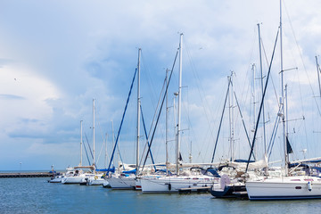 Fototapeta na wymiar sailboats are moored on a pier