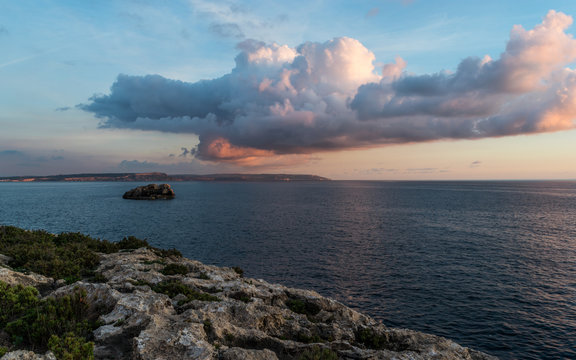 Mgarr Ix-Xini Bay Tower Gozo. Malta. Horizontal at sunset