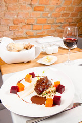 Beef cheeks with vegetables, roasted parsley root mousse , pearl barley, dark chocolate and demi glace sauce