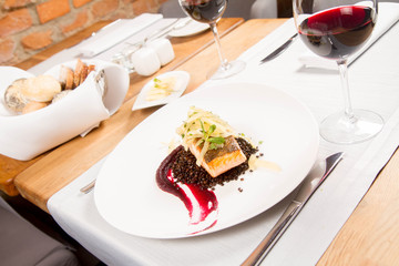 Baked salmon, beetroot mousse, black lentils and pear