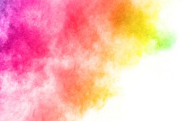 abstract powder splatted background. Colorful powder explosion on white background. Colored cloud....