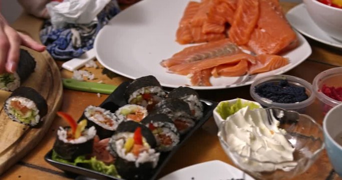 Cutting sushi roll