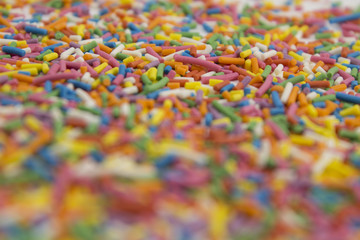 Obraz premium background of colorful candy sprinkles
