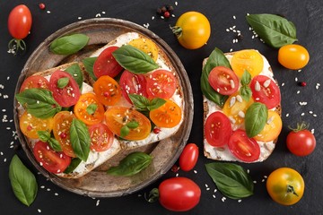 Sandwiches with cheese and tomatoes.