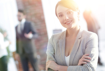 portrait of confident business woman on the background of the office.