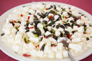 salad with feta cheese and roasted pumpkin seeds