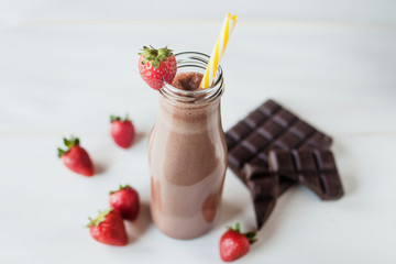 smoothie chocolate with strawberry or milkshakes, natural and organic drink in the glass jar