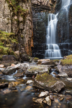 Wailing widow fall North Coast 500 Lairg, Scotland. Vertical. Long expousure. smoth waterflow