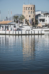 Puerto Banus marina of Marbella, on Costa del Sol, Spain, the view of moorish tower.