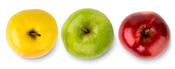 Three apples of different colors yellow, green and red on a white. The view from the top.