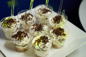 Traditional Tiramisu dessert in a Glass. Chocolate mouse with dark chocolate and a little whipped...