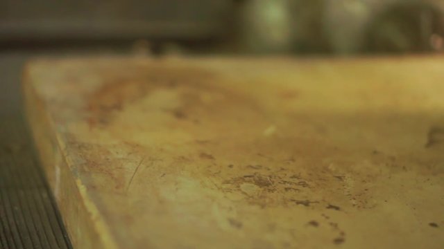 fingers roliing a clay coil