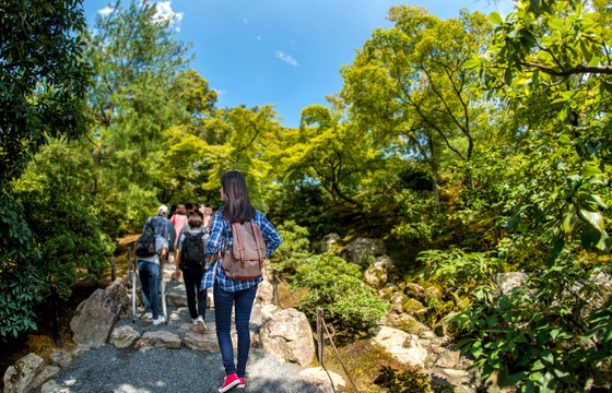 Tourists walking in Kinkakuji Temple " The Golden Pavilion" in Kyoto, Japan