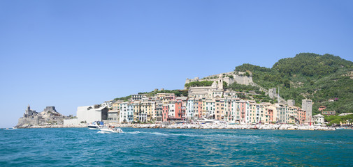 Naklejka premium Portovenere beautiful village viewed from boat in a sunny day