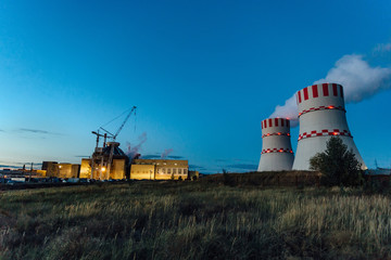 Fototapeta na wymiar Construction site of new nuclear power plant at night