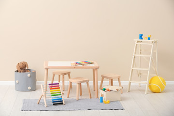 Stylish child's room interior with toys and new furniture
