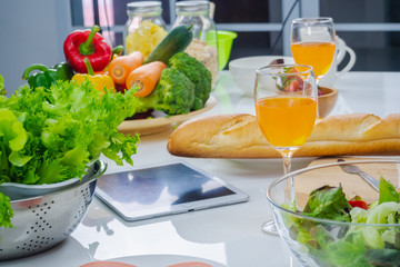 Group of friend cooking salad for breakfast with happiness at kitchen room.