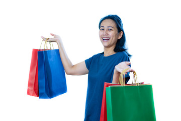 Asia women with shopping bag on white background