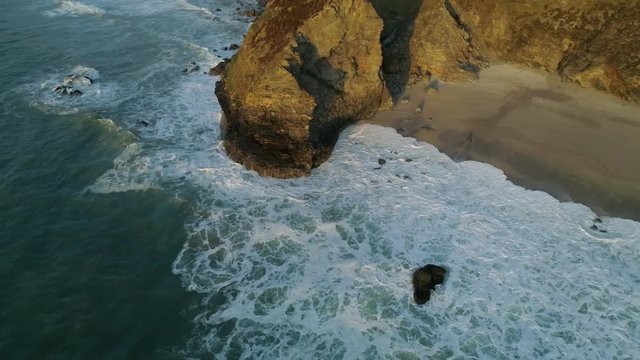 Coastal erosion of the cliffs along the coastline, drone aerial shot