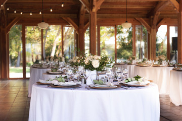 Wedding venue - wood restaurant dinner tables