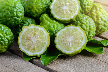 fresh bergamot fruit on wooden table