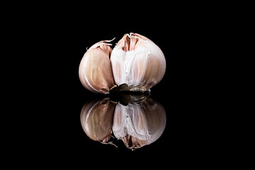 Garlic on black background