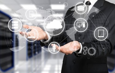 Man holding business elements icons on screen