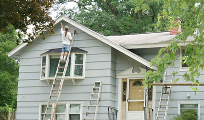 handyman painting house external wall for home renovation © nd700