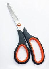 Scissors on white background