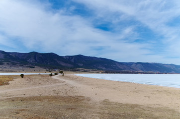 road from pebbles to the Small Sea of Lake Baikal in spring