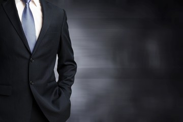 Midsection view of businessman in suit on