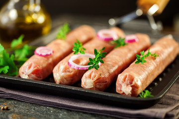 Kupaty - raw shashlik sausage of pork barbecue, grill. Raw sausage for grill.  Picnic. Selective focus.