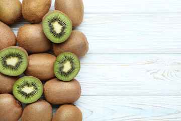 Kiwi fruits on white wooden table