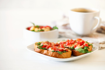  bruschetta with  tomatoes, mozzarella cheese and herbs
