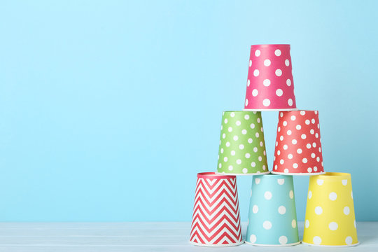 Colorful Paper Cups On Blue Background